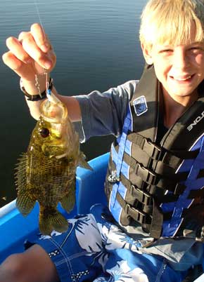 Boy with rock bass